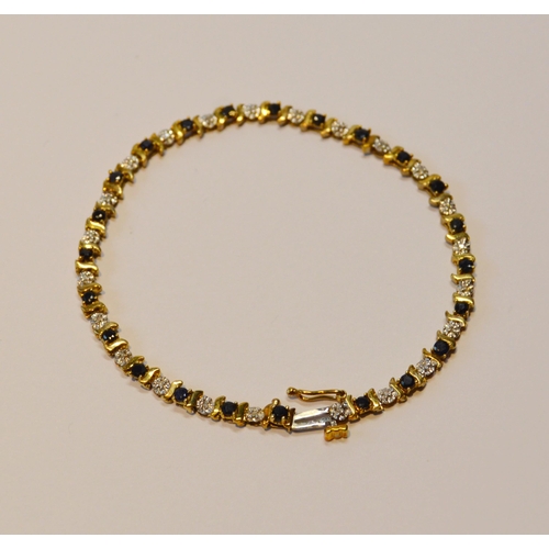 90 - 9ct gold bracelet set with diamonds and sapphires, 19cm long, 6g gross.