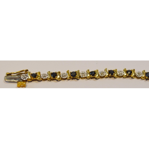 90 - 9ct gold bracelet set with diamonds and sapphires, 19cm long, 6g gross.