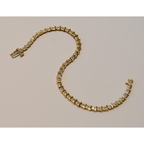 91 - 9ct gold bracelet set with small diamonds, '375', 18.5cm long, 5.8g gross.