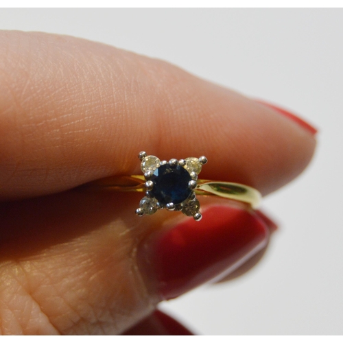 95 - Sapphire and diamond ring set with four diamond brilliants, in 18ct gold, size N, 2.5g gross.