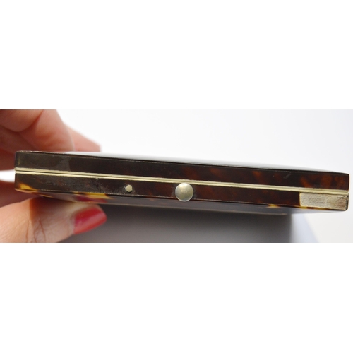 15 - Victorian aide memoire in tortoiseshell and mother of pearl, 10cm x 8cm.