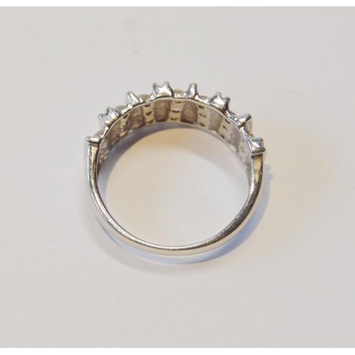 97 - Diamond half eternity-style ring with twenty-one diamonds, in 9ct white gold, size Q, 4.3g gross.