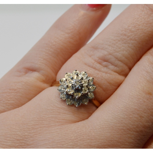 98 - Diamond cluster ring in 9ct gold, size O, 3g gross.