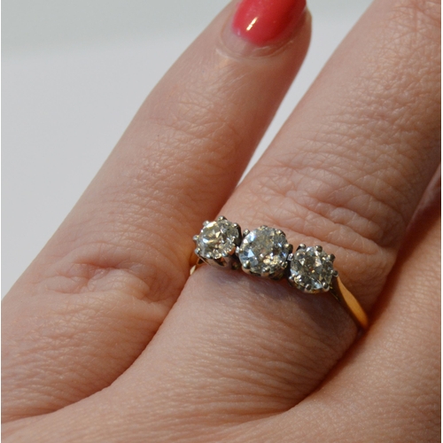 100 - Diamond three-stone ring with old-cut brilliants, approximately .5ct each, total diamond content app... 