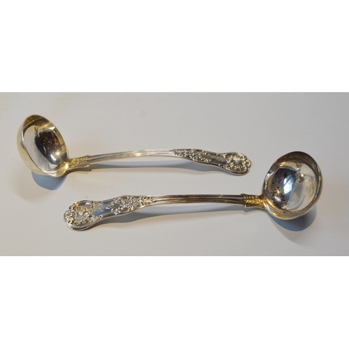 35 - Pair of silver toddy ladles of Queen's pattern, Glasgow 1861, and a silver sauce boat, 1935, 183g or... 