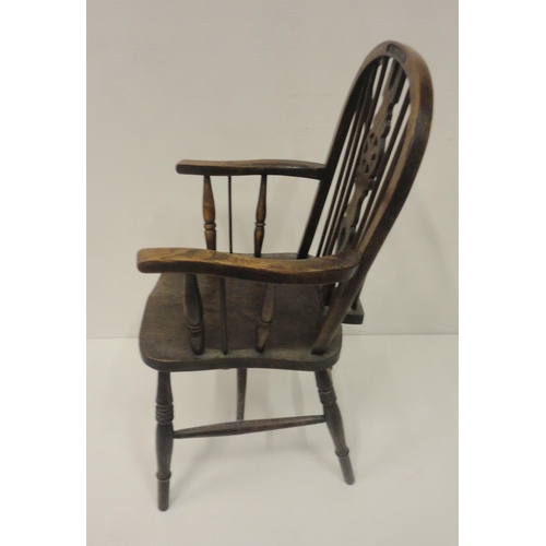 413 - 19th century ash and elm Windsor chair, the hoop frame with central wheel splat flanked by spindle s... 