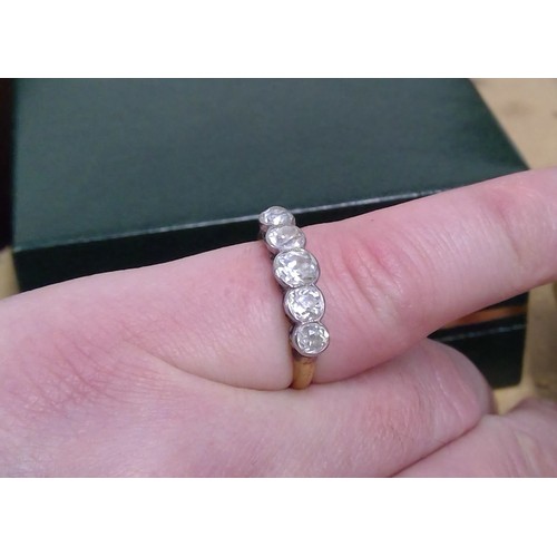 181 - 18ct gold diamond five stone ring, the central diamond approximately 0.5ct, flanked by 0.3ct and 0.2... 