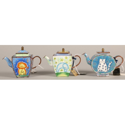 Three Charlotte di Vita enamelled copper tea pots, cased numbered