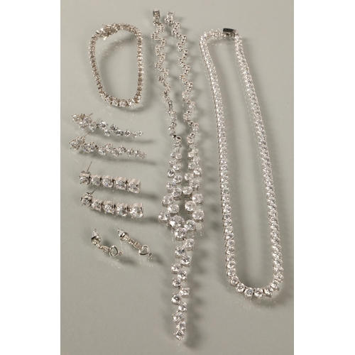 77 - Assortment of white gem set jewellery, some silver hardware, including three pairs of drop earrings,... 