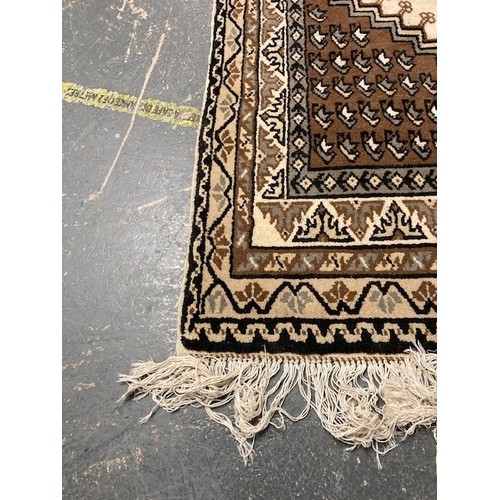 507 - Persian design brown and white rug.