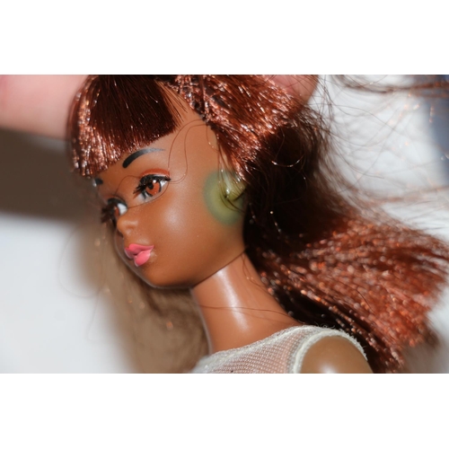 1083 - 1960s Mattel Inc Toymakers Barbie doll Barbie's Cousin Francie (1966) with brown skin tone, wearing ... 