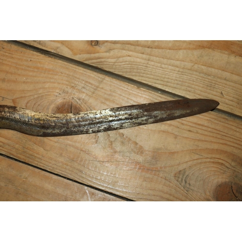 1553 - Malaysian kris with typical ornate flamberge blade, white metal wire bound grip and ivory birds head... 