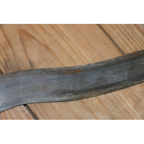 1554 - Malaysian kris with typical ornate flamberge blade, white metal wire bound grip and treen birds head... 