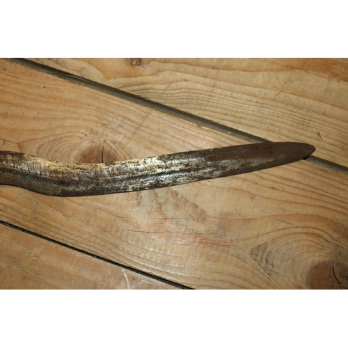 1553 - Malaysian kris with typical ornate flamberge blade, white metal wire bound grip and ivory birds head... 