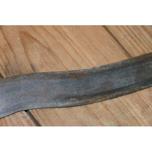 1554 - Malaysian kris with typical ornate flamberge blade, white metal wire bound grip and treen birds head... 