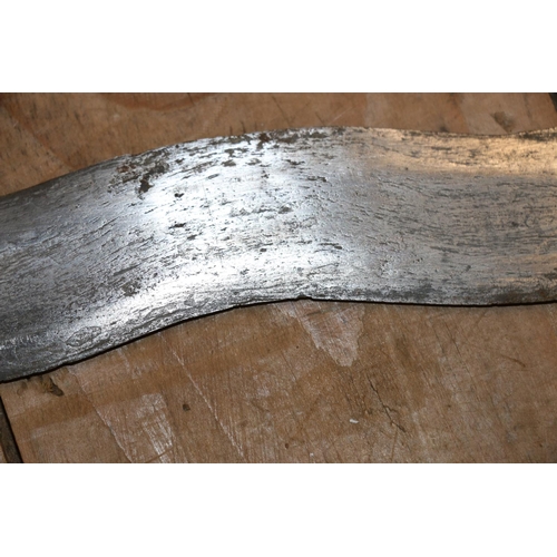 1554 - Malaysian kris with typical ornate flamberge blade, white metal wire bound grip and treen birds head... 