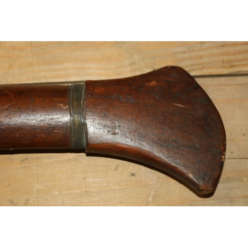 1554 - Malaysian kris with typical ornate flamberge blade, white metal wire bound grip and treen birds head... 