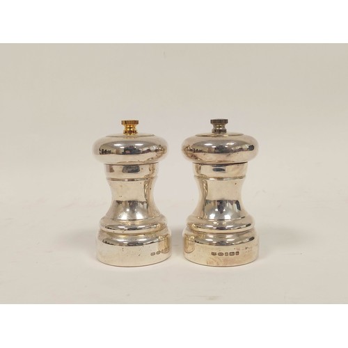 211 - Pair of silver salt and pepper mills by Roberts & Dore Ltd Sheffield 2008. Height 11cm  440grms ... 