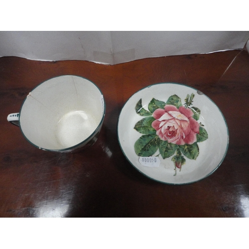 12 - Group of Wemyss pottery to include a lidded preserve pot, tea cup and saucer, egg cup, strainer and ... 