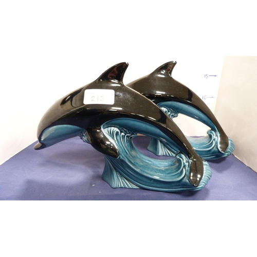 Pair of Poole Pottery dolphin figures. (2)
