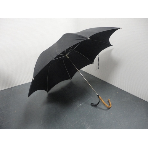 26 - Parasol with bamboo handle.