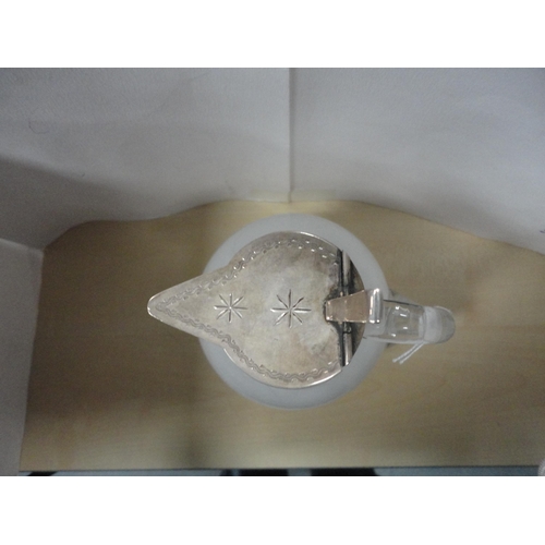 3 - Cut glass ewer of ovoid shape with engraved silver mounts, Birmingham 1896, 19cm.