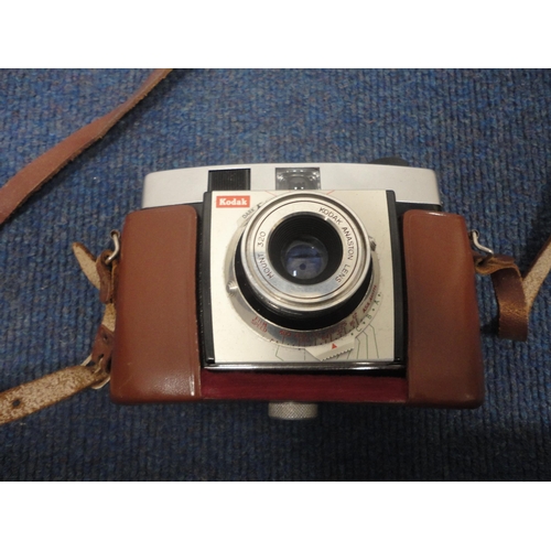 43 - Bag containing cameras and accessories to include Chinon, INA F350MM F5.5 lens, Kodak Colorsnap 35 e... 