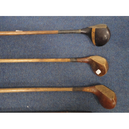 47 - Group of antique hickory-shafted gold clubs to include examples by Special, Defiance etc.  (7)