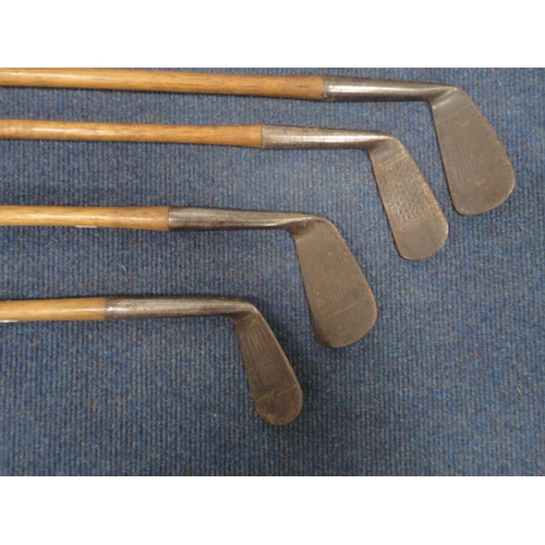 47 - Group of antique hickory-shafted gold clubs to include examples by Special, Defiance etc.  (7)