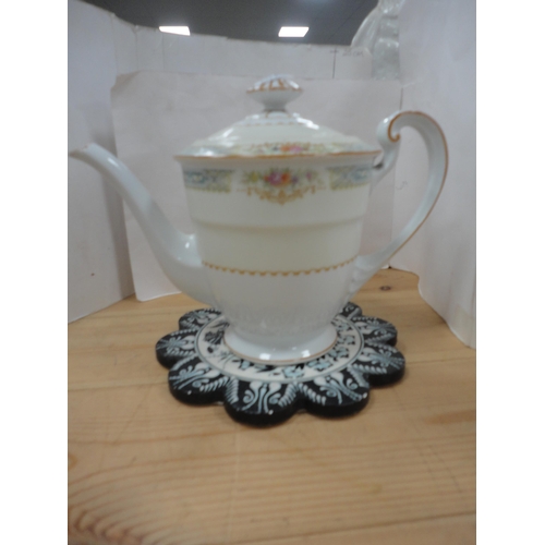 53 - Green Burlington ware toby jug, brass table bell in the form of a hoplite helmet, coffee pots etc.