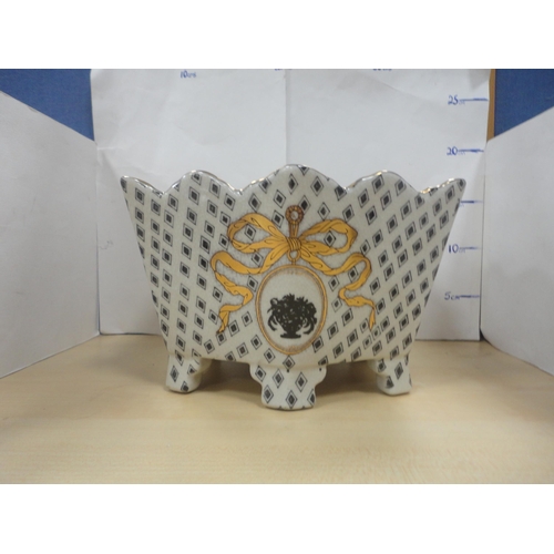 6 - Group of ceramics to include a Royal Worcester bowl, planter, doll's tea set etc.