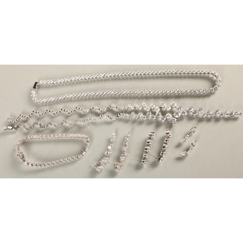 77 - Assortment of white gem set jewellery, some silver hardware, including three pairs of drop earrings,... 