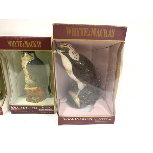 26 - Three Whyte and Mackay Scottish Birds of Prey decanters to include Osprey, Buzzard and Falcon, 35cl,... 