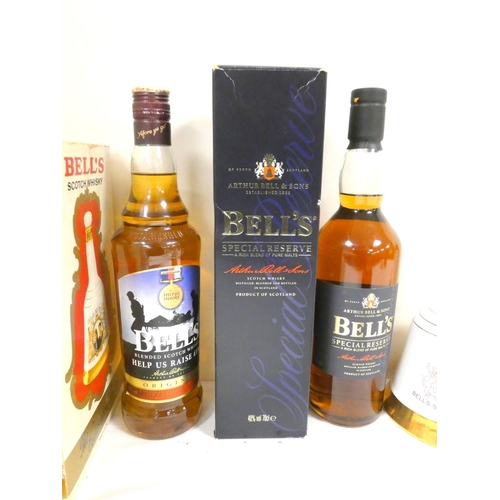 50 - Four bottles of BELLS blended Scotch whisky to include Andrew and Fergie Royal Wedding 1986 75cl 43%... 