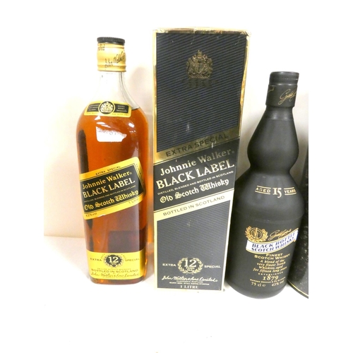 52 - Four bottles of blended Scotch whisky to include BLACK BOTTLE 15 year old 43% abv. 75cl, JOHNNIE WAL... 