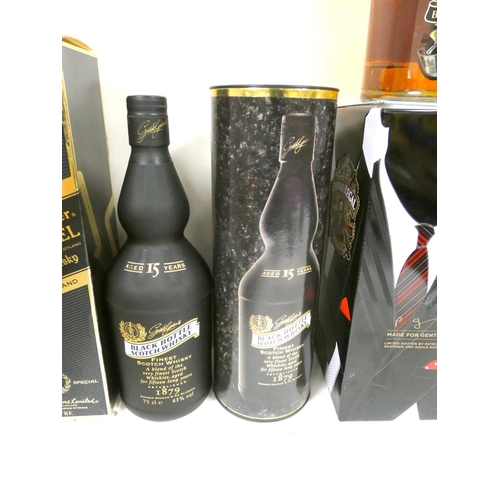 52 - Four bottles of blended Scotch whisky to include BLACK BOTTLE 15 year old 43% abv. 75cl, JOHNNIE WAL... 