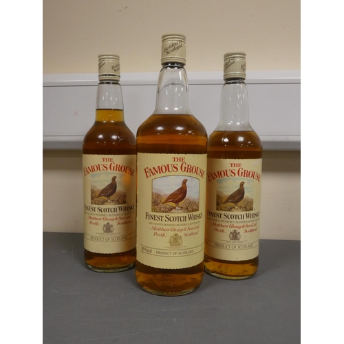 70 - Three bottles of The Famous Grouse finest Scotch whisky, One bottle 1 Litre, 40% vol, The other two ... 