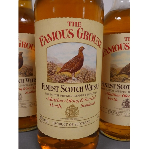 70 - Three bottles of The Famous Grouse finest Scotch whisky, One bottle 1 Litre, 40% vol, The other two ... 