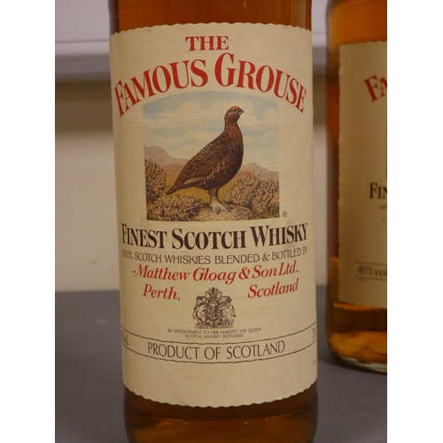 70 - Three bottles of The Famous Grouse finest Scotch whisky, One bottle 1 Litre, 40% vol, The other two ... 