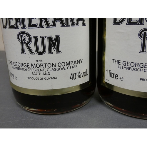 76 - Two 1 Litre bottles of O.V.D old vatted Demerara rum, Bottled circa 1980s, Imported by The George Mo... 