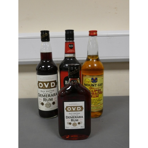 81 - Four bottles of rum to include O.V.D old vatted Demerara rum, Bottled circa 1980s, Imported by Georg... 