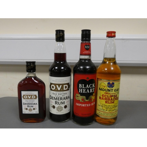 81 - Four bottles of rum to include O.V.D old vatted Demerara rum, Bottled circa 1980s, Imported by Georg... 