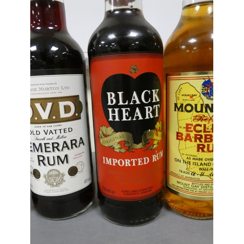 81 - Four bottles of rum to include O.V.D old vatted Demerara rum, Bottled circa 1980s, Imported by Georg... 