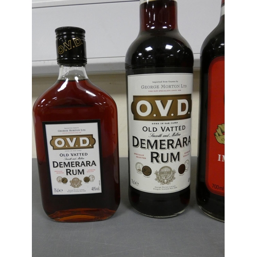 81 - Four bottles of rum to include O.V.D old vatted Demerara rum, Bottled circa 1980s, Imported by Georg... 