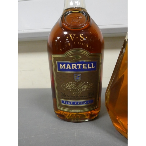 82 - Two bottles of Martell V.S fine cognac, 70cl, 40% vol, with a glass decanter containing amber colour... 