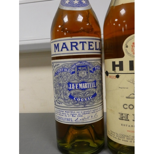 83 - Hine three star cognac, Bottled circa 1970s, 70 proof, 24 fl ozs, with Martell very old pale cognac,... 