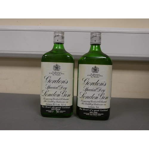 84 - Two bottles of Gordon's Special Dry London gin, Bottled circa 1970s / 80s, 75cl, 40% vol, 75.7cl, 26... 