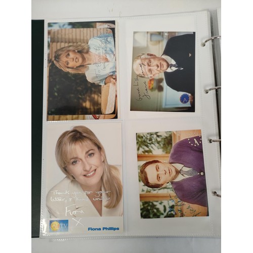 476 - A well filled celebrity autograph album with examples from Chris De Burg, Philip Scofield, Leslie As... 