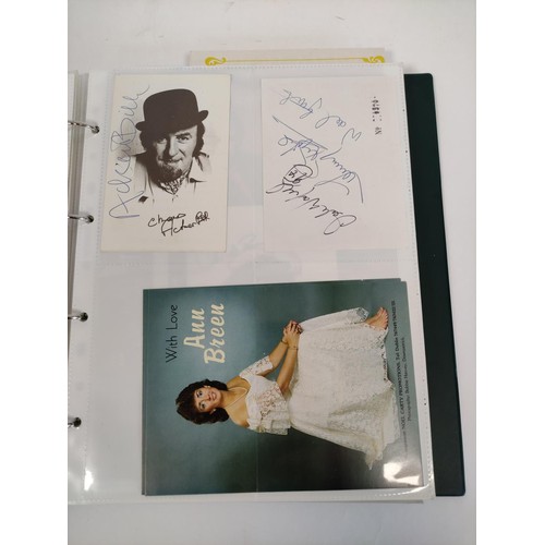 476 - A well filled celebrity autograph album with examples from Chris De Burg, Philip Scofield, Leslie As... 