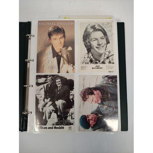 476 - A well filled celebrity autograph album with examples from Chris De Burg, Philip Scofield, Leslie As... 